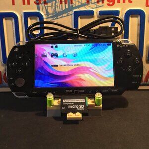 Sony PSP 2001 with Charger, Memory Stick, & Games